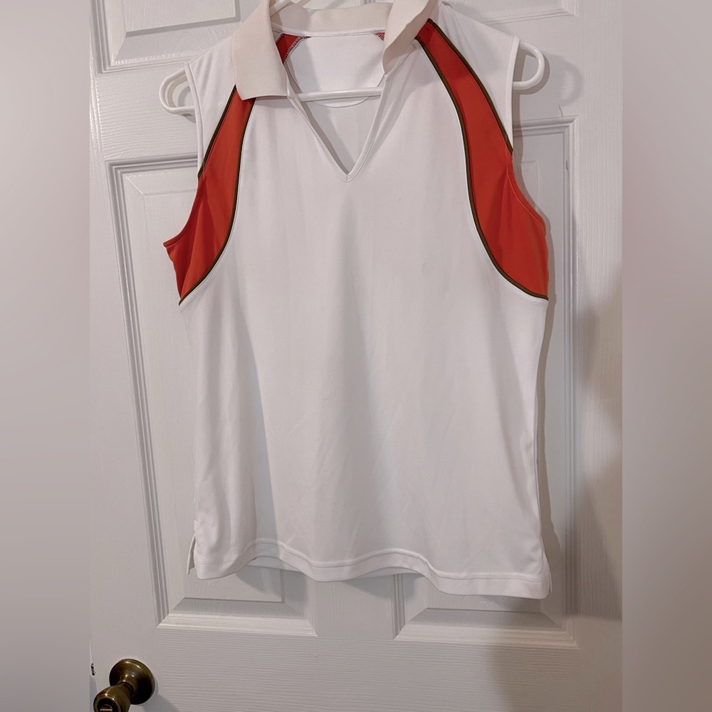 White with orange and Planck ladies golf shirt size small